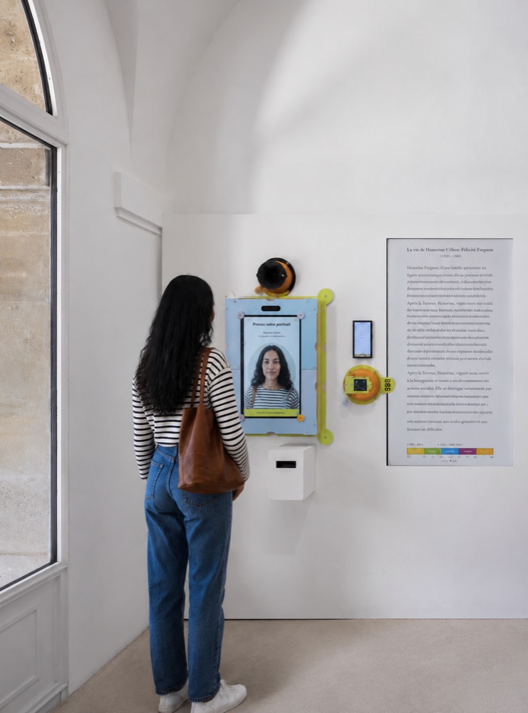 A visitor arriving at Portrait Bureau